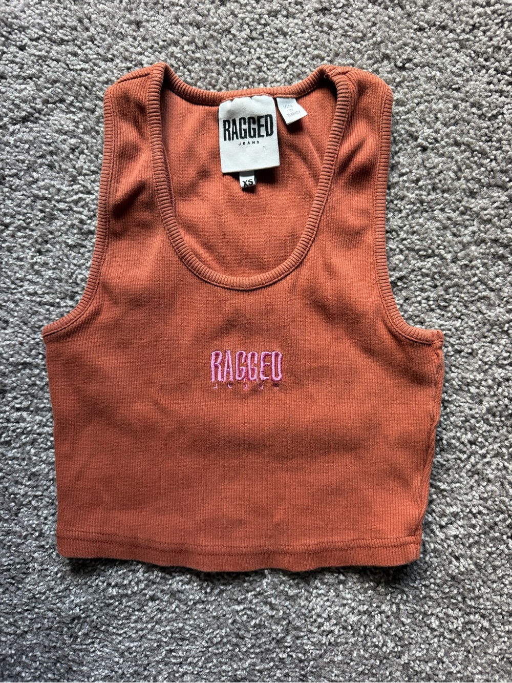 The Ragged Priest Rust Ribbed Cropped Tank with Pink Logo